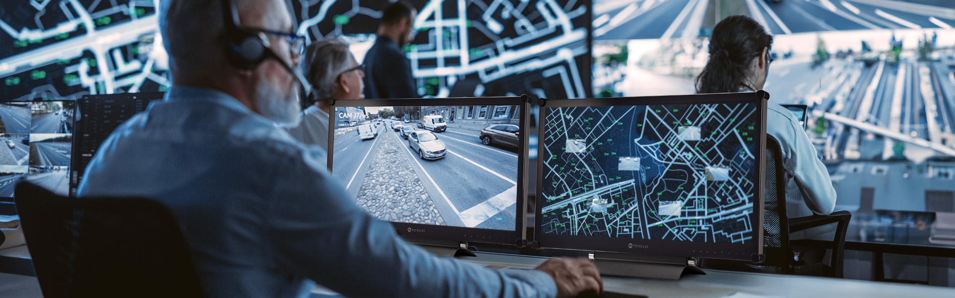 AG Neovo 24 inch SDI monitor is being used by a man in traffic control room